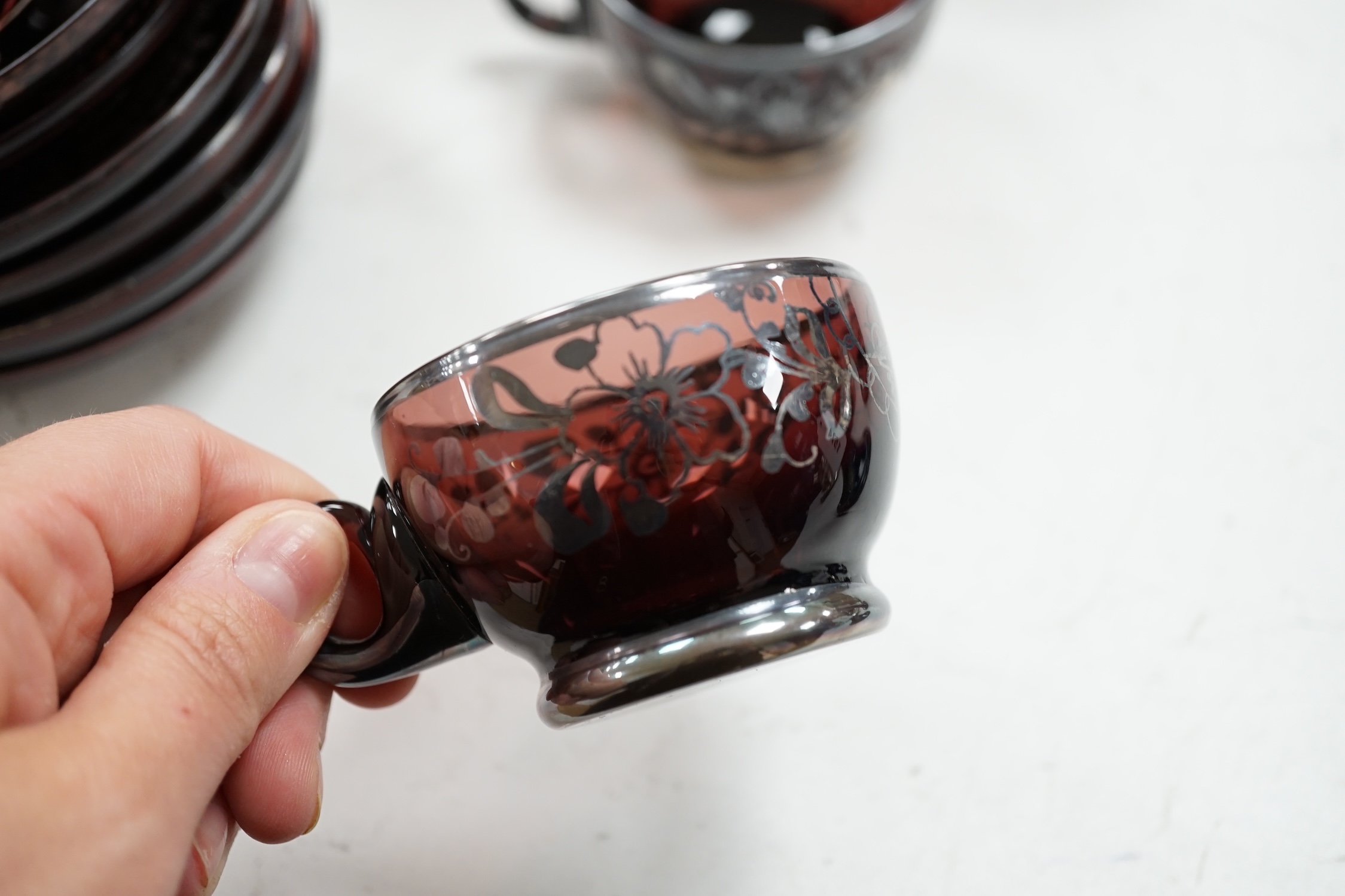 A Venetian amethyst glass tea set. Condition - some damage